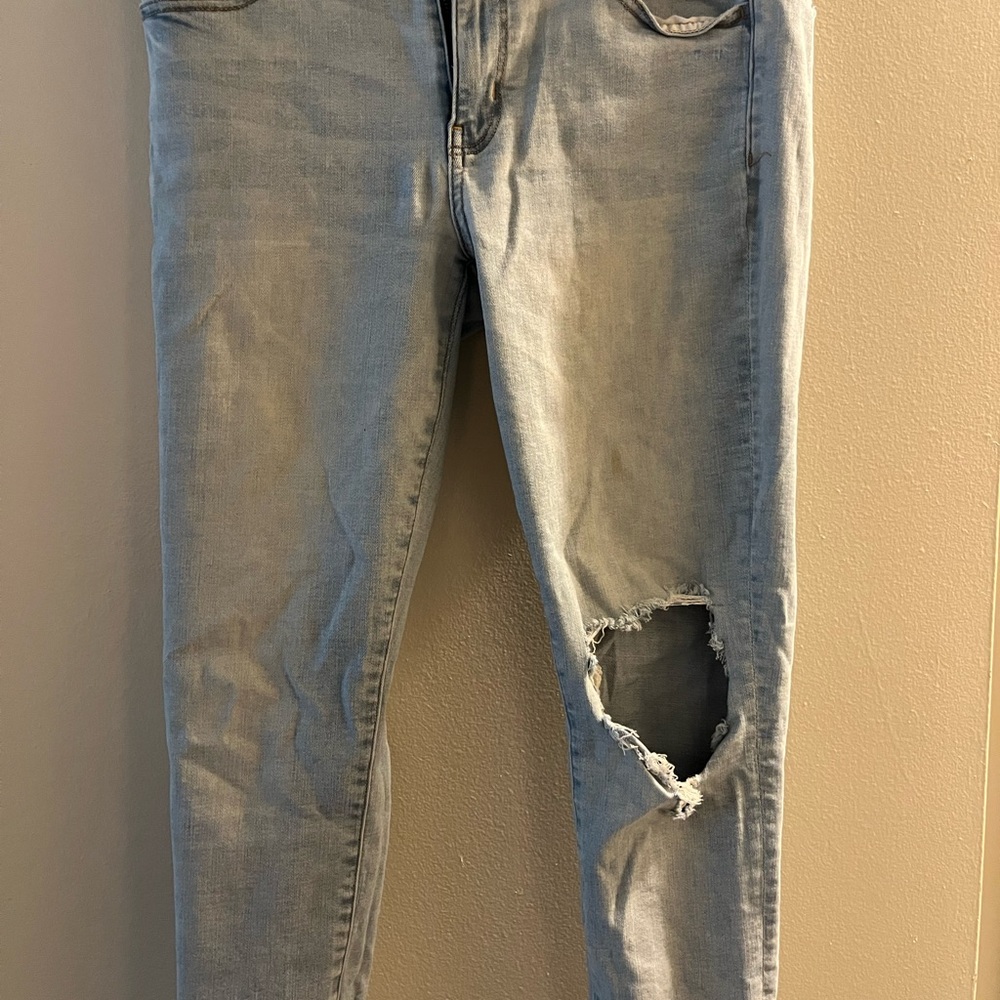 Distressed Light Blue Jeans